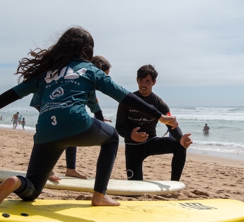 Explaining the surf basics on the beach